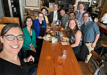 ACM TOCE board members and authors meet for lunch between sessions.