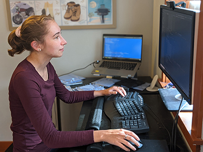 A student working on a computer.