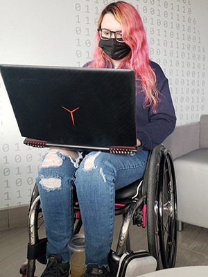 A student working on a computer.